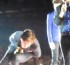 Styles hit in crutch by shoe on stage