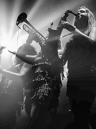 L-R: Kat Rodriguez (tenor/baritone saxophone), Crystal Torres (trumpet) and Adison Evans (saxophone).
