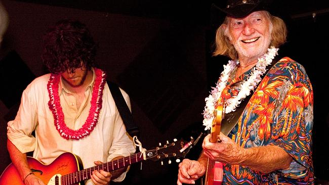 Legendary crooner Willie Nelson, right, performs with his son Micah Nelson's band, The Reflectacles, in 2010 Picture: AP Photo/J