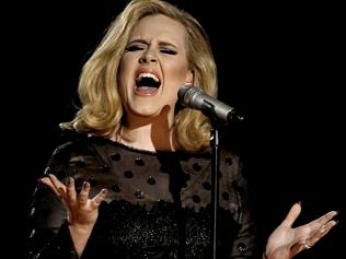 Robbie Williams had to pluck up the courage to ask Adele to sing on Swings Both Ways