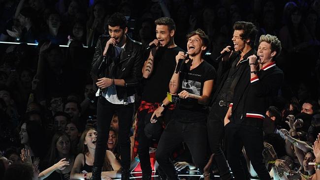 Zayn Malik, Liam Payne, Louis Tomlinson, Niall Horan and Harry Styles of One Direction speak onstage at the MTV Video Music A...