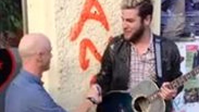 The Berlin busker meets Jimmy Somerville. Photo: YouTube