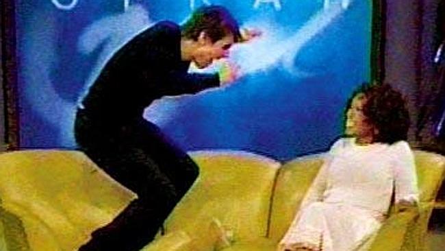 Tom Cruise pictured achieving the impossible: making Oprah seem normal by comparison. 