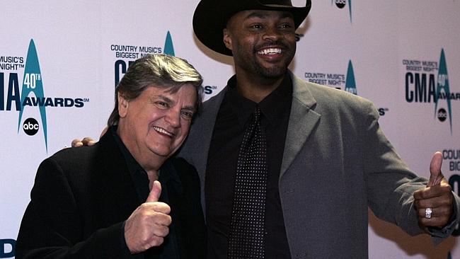 Phil Everly, left, and Cowboy Troy arrive at the 40th Annual CMA Awards in Nashville back in 2006. Picture: AP