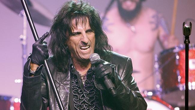 Alice Cooper played a gig injured just so he could get paid. (AP Photo/Chris Carlson)