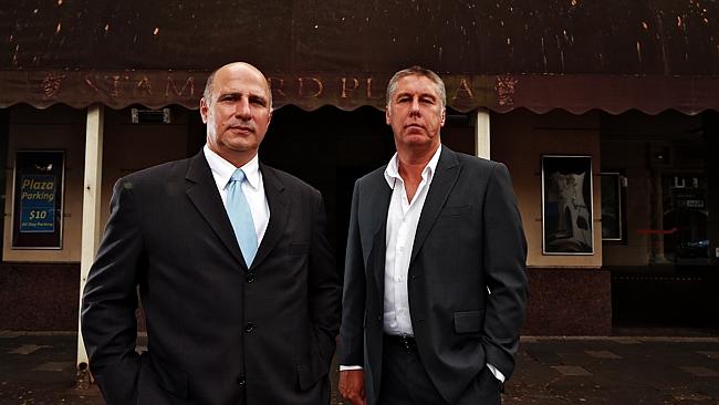 Former police officers Mick Gerondis (left) and Mark Smith, who investigated Michael Hutchence death, revist the scene at the...