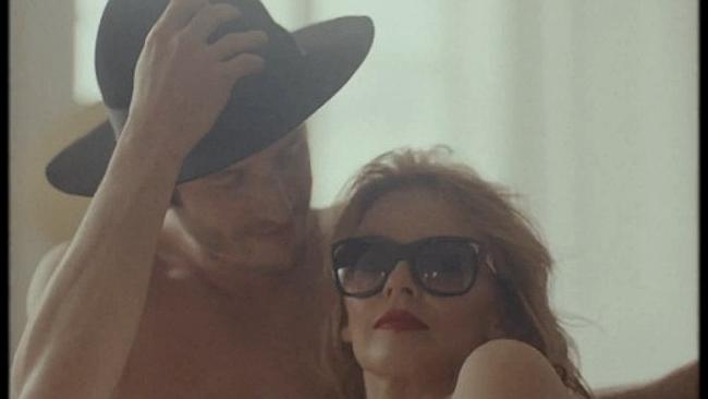 Minogue and beau in her new music video. So THAT'S where Pharrell's Gra...