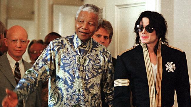 Worldwide fame ... then South African President Nelson Mandela, left, and Michael Jackson