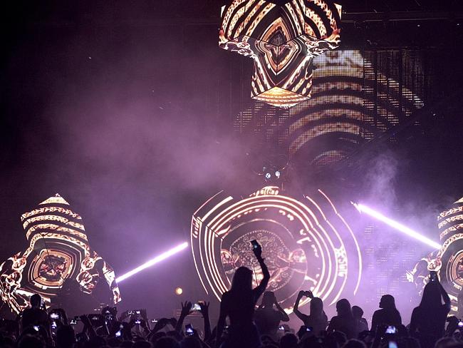 Crowd pleaser ... Deadmau5 performs for energetic fans at the 2014 Future Music Festival 