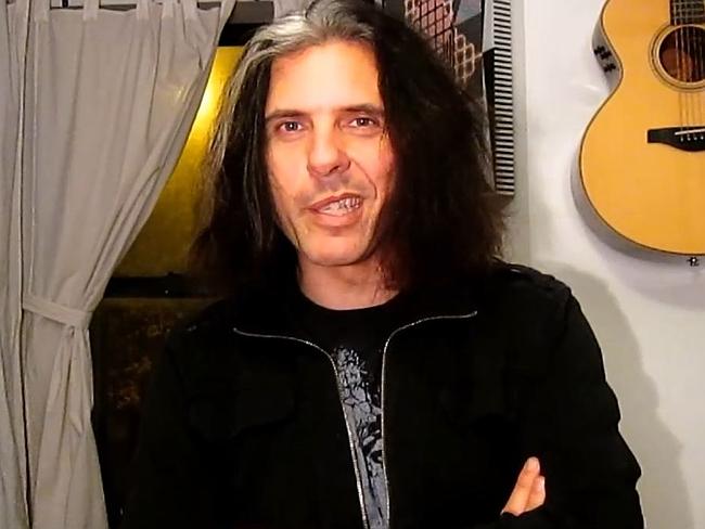 ’F**k you!’ ... Alex Skolnick mistakenly flipped off his own cover art on stage.