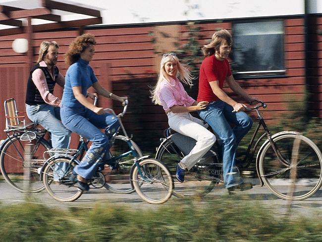It couldn’t happen now ... Benny, Agnetha, Frida and Bjorn cycle though their neighbourho