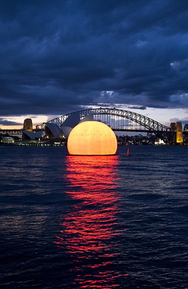 Huge sun orb in Sydney Harbour for dress rehearsals of Madama Butterfly.