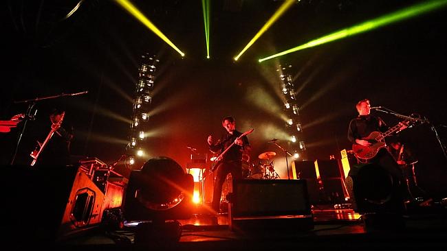 Queens of the Stone Age bring a sexy swagger and a knowing wink to dirty rock and roll. P