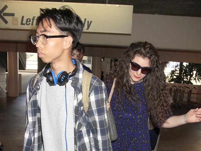 Lorde and her boyfriend James Lowe as they arrive in Los Angeles.