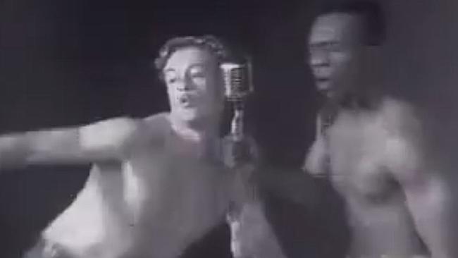 Lip-synching Simon ... Simon Baker (left) gives Euphoria a hand for their Love You Right