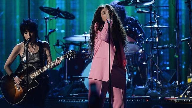 Teen spirit ... Lorde, right, with Joan Jett, fronts Nirvana as they are inducted into th