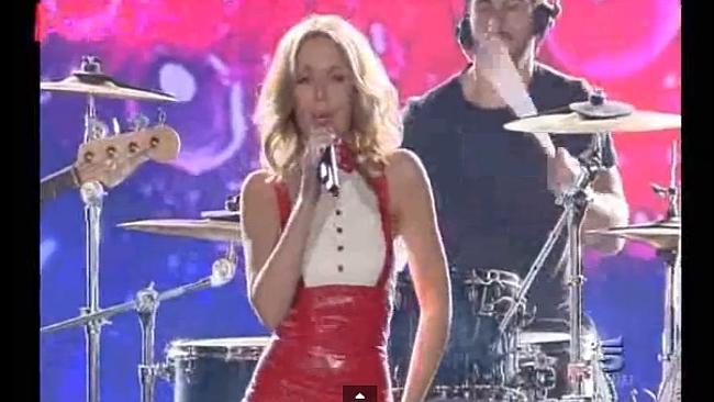 Kylie Minogue performing on Italian TV to a visibly unimpressed Robert De Niro.