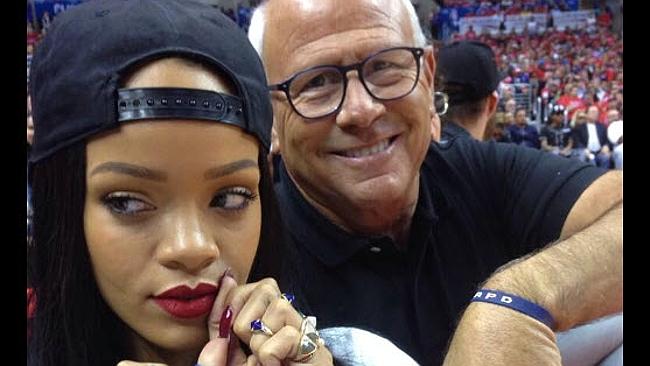 Rihanna and Steve Soboroff at the game.