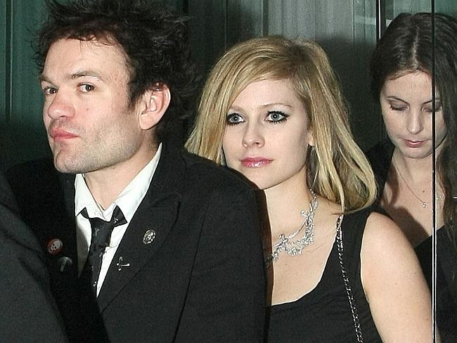Happier days ... Avril Lavigne with her ex-husband Deryck Whibley.