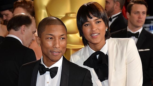 Pharrell Williams and his wife Helen Lasichanh at the 2014 Oscars. Picture: Michael Buckn