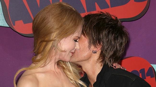 Not afraid of a little PDA ... Keith Urban and Nicole Kidman at the CMT awards in Nashvil