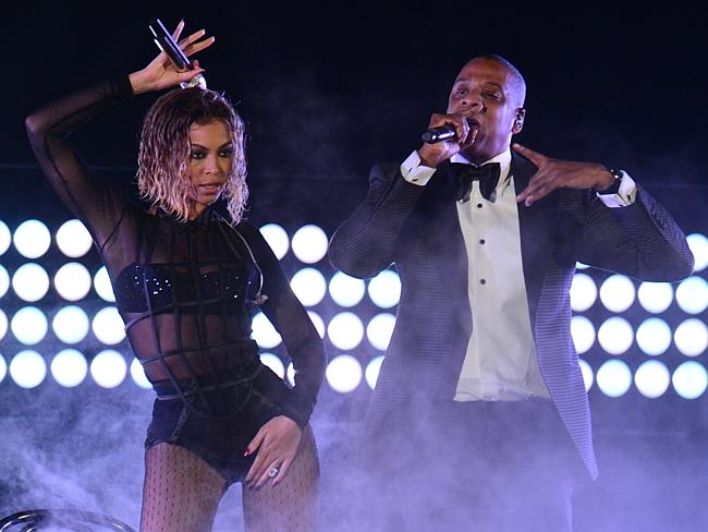 Overrated? Beyoncé Knowles and Jay Z perform on stage for the 56th Grammy Awards.