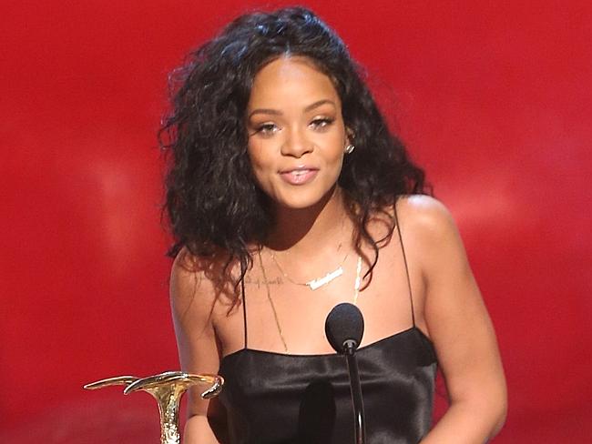 Rihanna clearly has the munchies backstage.