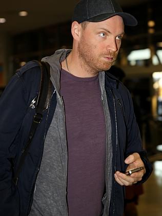 Guitarist Jonny Buckland from Coldplay arrives at Sydney airport today. Picture: John Gra