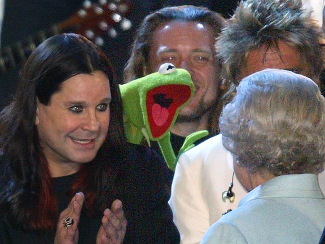 Royal reception ... Queen Elizabeth II is introduced to Ozzy Osbourne and Kermit the Frog