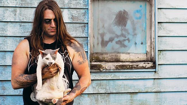Rock on ... Brooks Blackhawk and cat Fred. Picture: Alexandra Crockett published by Power
