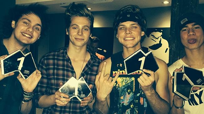 5 Seconds Of Summer pose after being presented with ARIA No.1 awards.