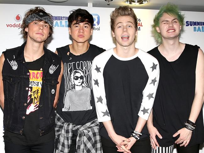 Ashton, Calum, Luke and Michael at the Capital Summertime Ball in Wembley Stadium, London