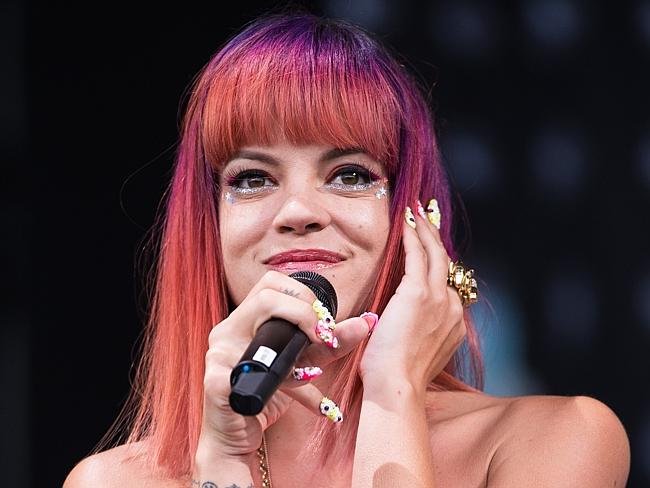 On stage ... Lily Allen performing on the Pyramid Stage at the Glastonbury Festival in En