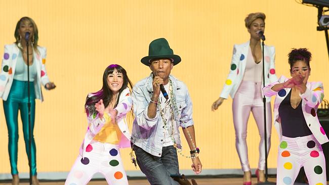 Happy days ... Pharrell Williams owned the ARIA singles charts with Happy, amassing sales