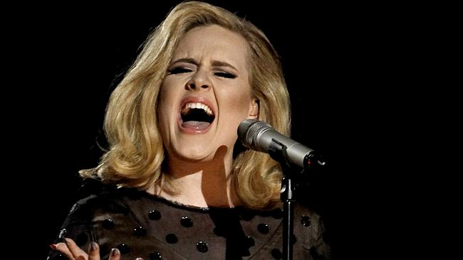 Staying mum ... Adele performs during the 54th annual Grammy Awards in Los Angeles last y