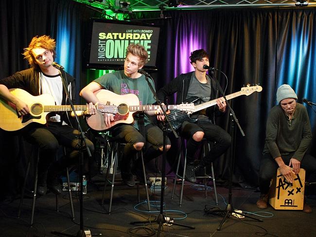 Debut at #1 in US album charts ... 5 Seconds of Summer, (from left) Michael Clifford, uke