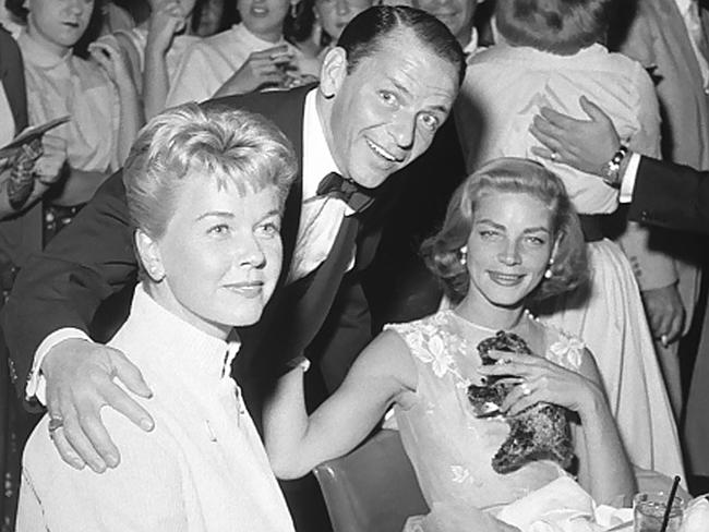 Doris Day, Frank Sinatra and Lauren Bacall are seen at the Sands Hotel on September 14, 1