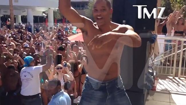 Will Smith ripped his shirt off during the performance.