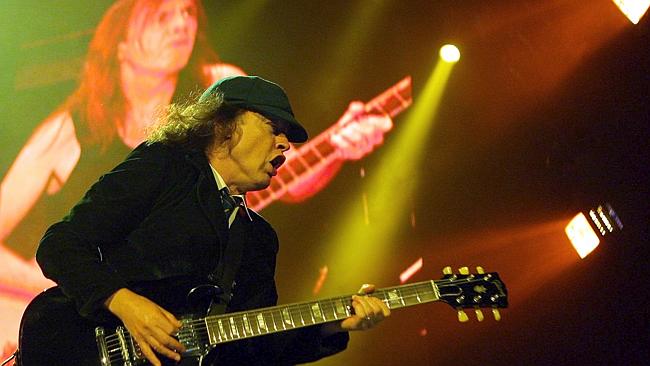 World rock gods ... guitarist Angus Young on stage with AC/DC.