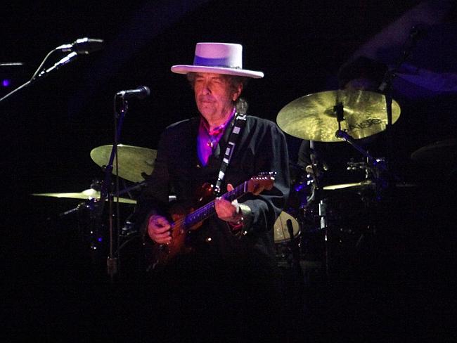 From a previous concert tour ... the guitar is no longer a fixture of Dylan’s concerts.