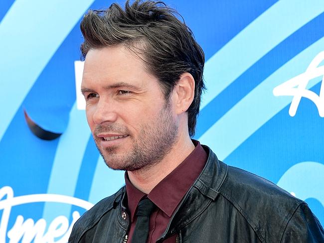 Johns attends the American Idol 2013 finale. Picture: Getty