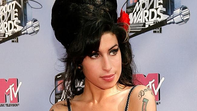 Iconic look ... Winehouse sporting her distinctive beehive hairdo at the 2007 MTV Movie A