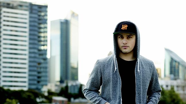 Under attack ... Australian hip hop star Illy walked off stage to protect himself and his