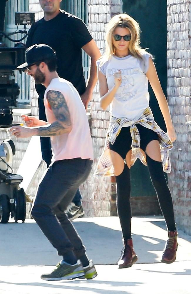 Adam Levine and wife Behati Prinsloo on the set of Maroon 5’s upcoming music video.
