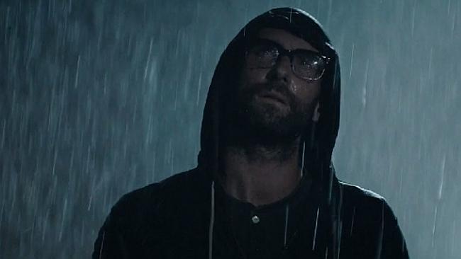 Adam Levine takes on the role of creepy stalker photographer in Maroon 5’s Animals.