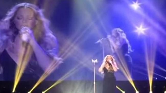 Struggling ... Mariah Carey opted to speak-sing the lyrics in Tokyo after failing to hit 