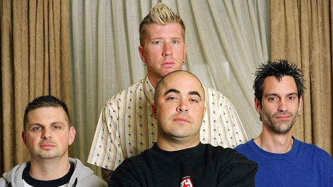 Aaron Lewis (centre) and his Staind band mates.