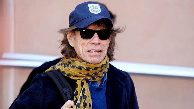 Still spry at 71 ... Mick Jagger leaves the Intercontinental Hotel in Adelaide. Photo: Ca