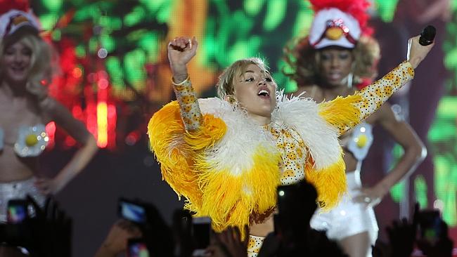 Miley Cyrus performs live at her opening night of The Bangerz Tour