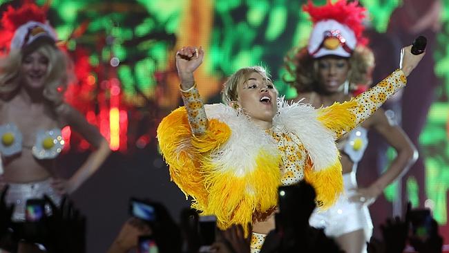 Colourful ... Miley Cyrus performs in New Zealand. Picture: Getty